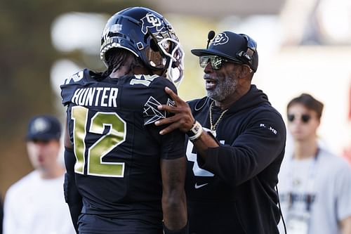 Travis Hunter, left, Deion Sanders, right during North Dakota State vs. Colorado - Source: Getty