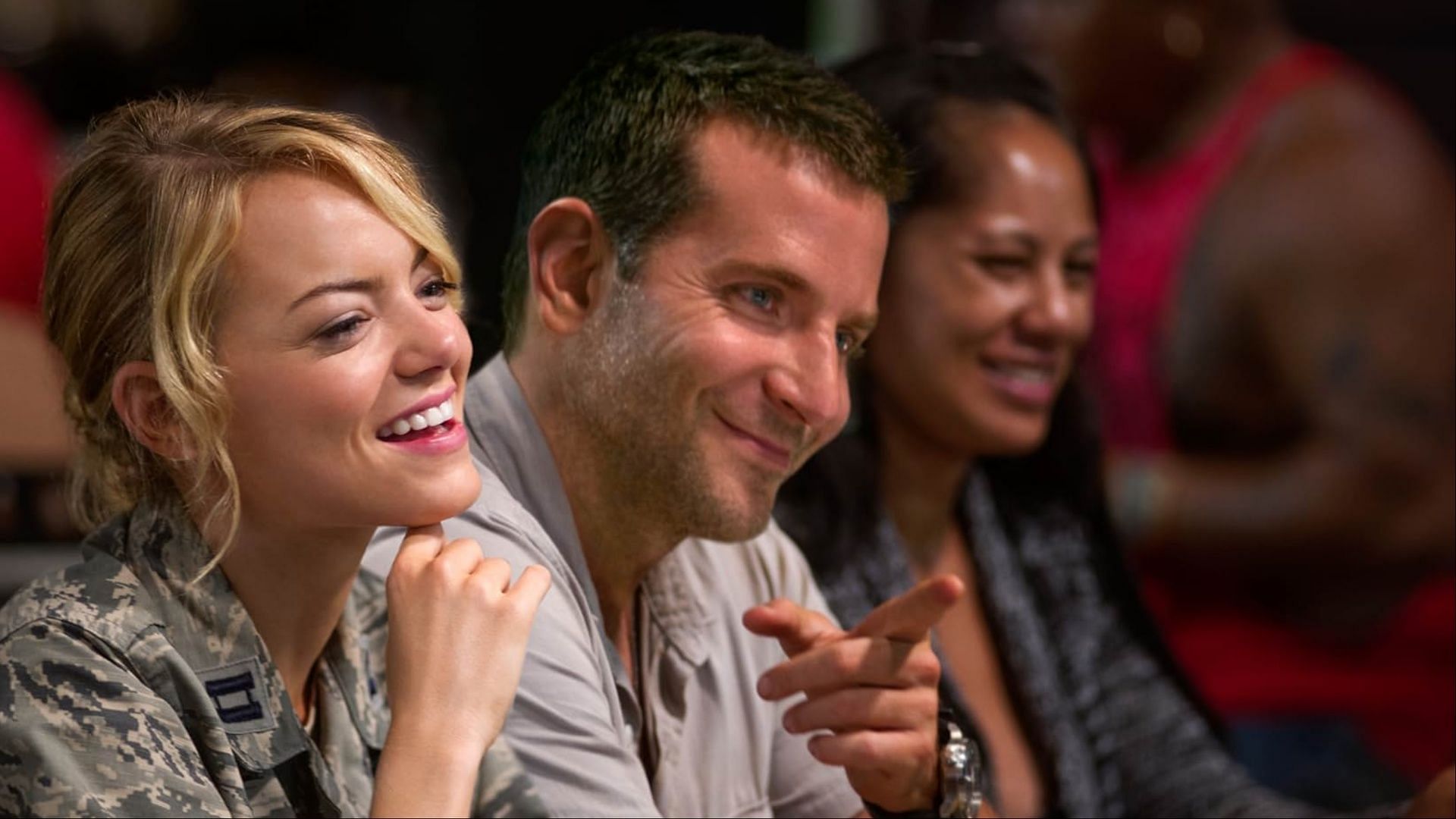 Aloha stars Bradley Cooper and Emma Stone. (Image via 20th Century Fox)