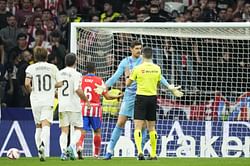 Atletico Madrid vs Real Madrid clash temporarily suspended as Atleti fans throw objects at Thibaut Courtois