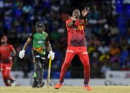 Dwayne Bravo celebrates a wicket in his trademark fashion. (Image Credits: Getty Images)