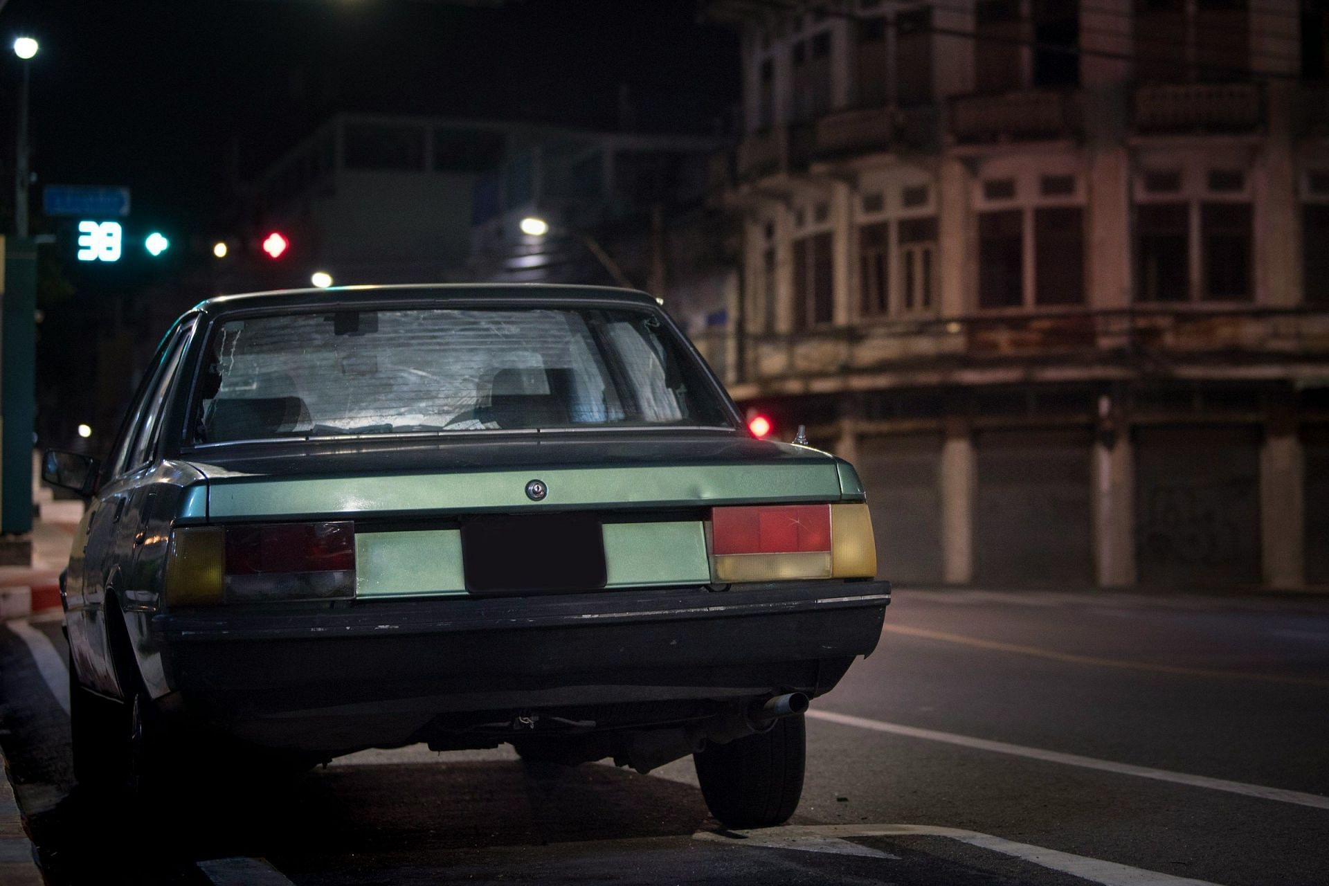 https://unsplash.com/photos/black-car-parked-on-road-mqb9RHr4SOo