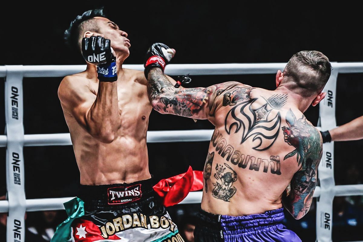 Liam Harrison landing a left hook against Mohammed bin Mahmoud in their January 2020 fight. [Photo via: ONE Championship]