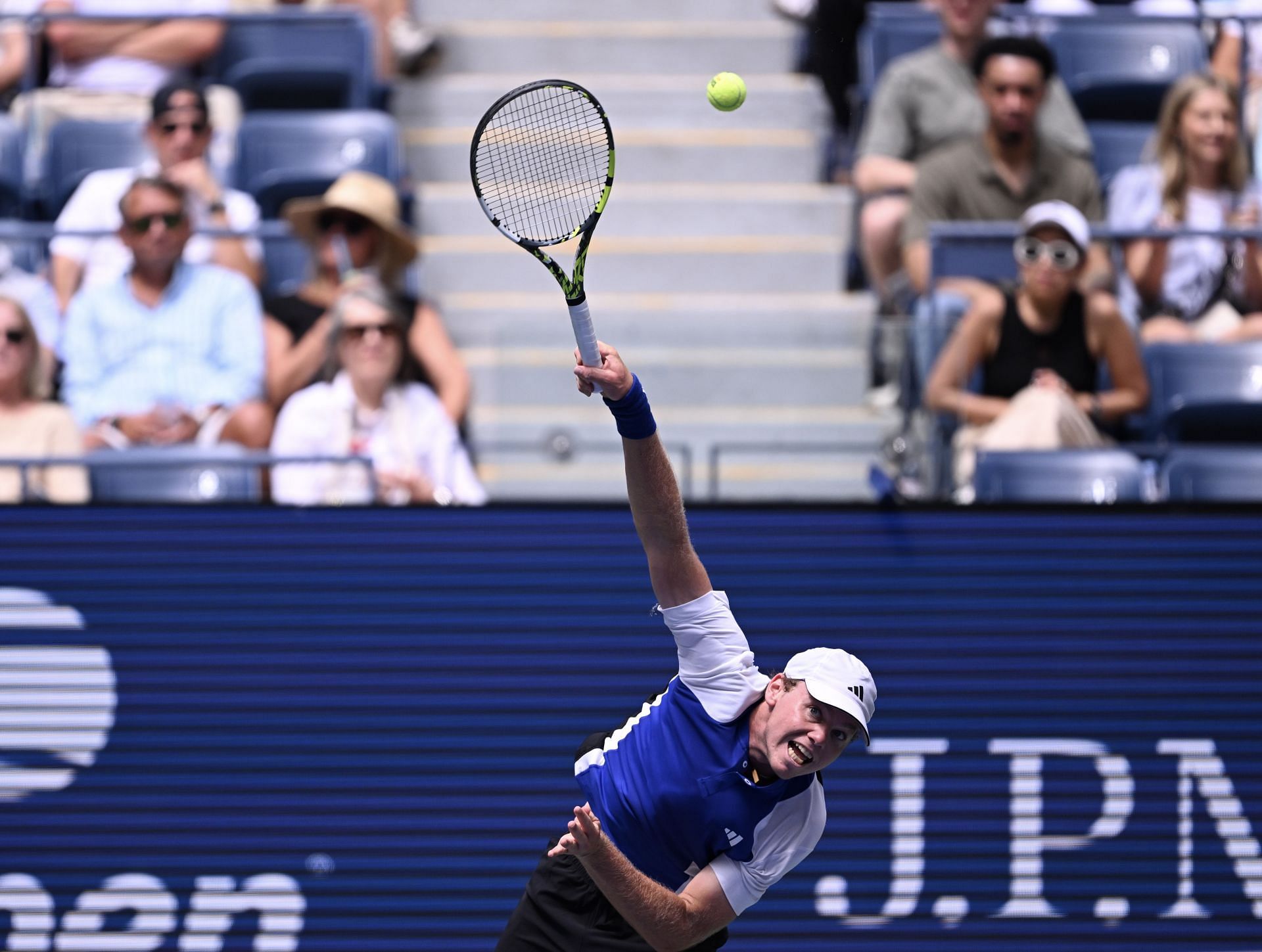 Michelsen fires a serve in the US Open 2024 - Day 4 (Image via Getty)