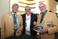 Ron Mix (right) at Pro Football Hall of Fame Merlin Olsen Super Bowl Luncheon - Source: Getty