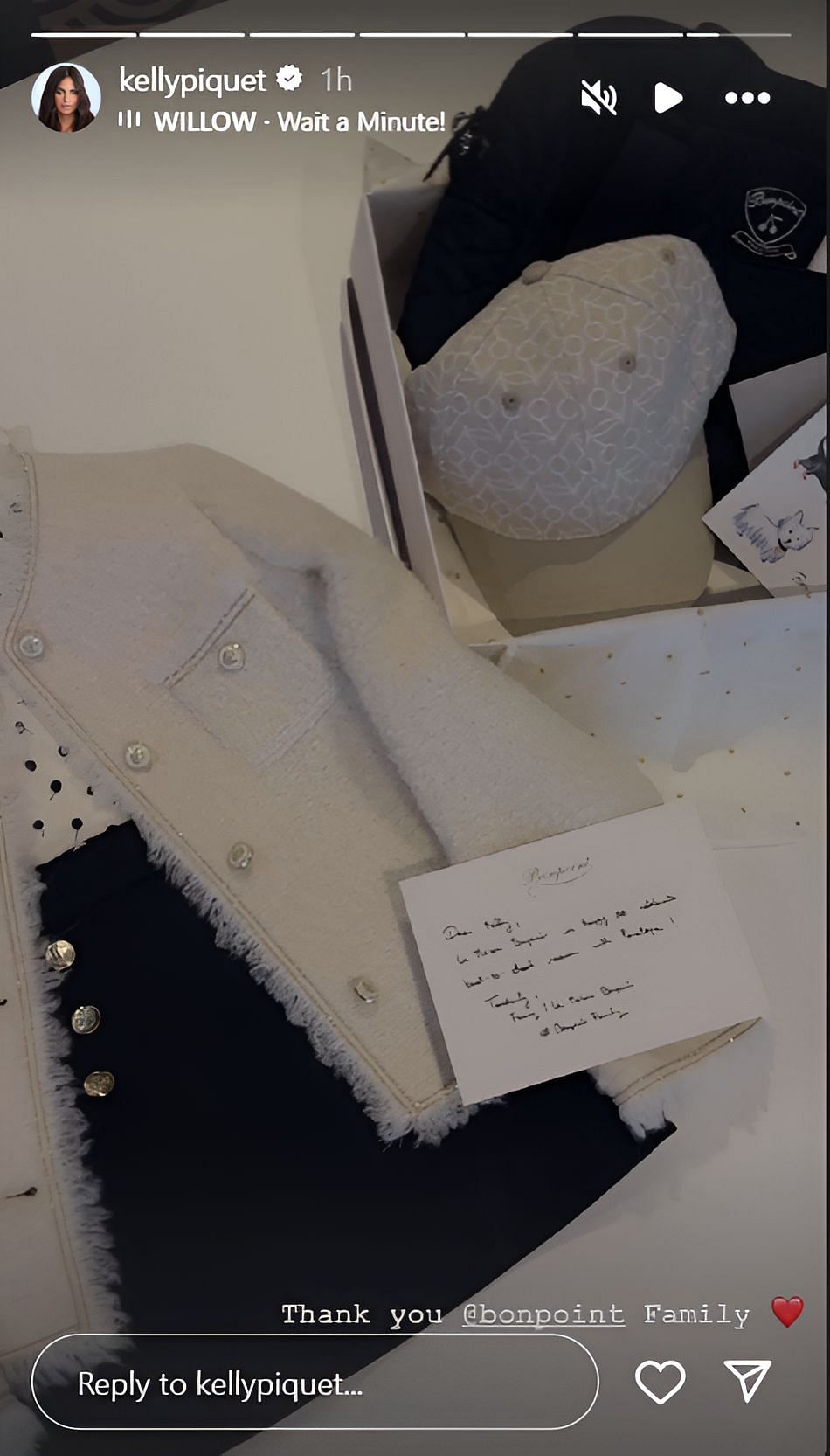 Dress with a matching cap, a sling bag, and a personalized note for Kelly Piquet and Penelope (Source: @kellypiquet on Instagram)