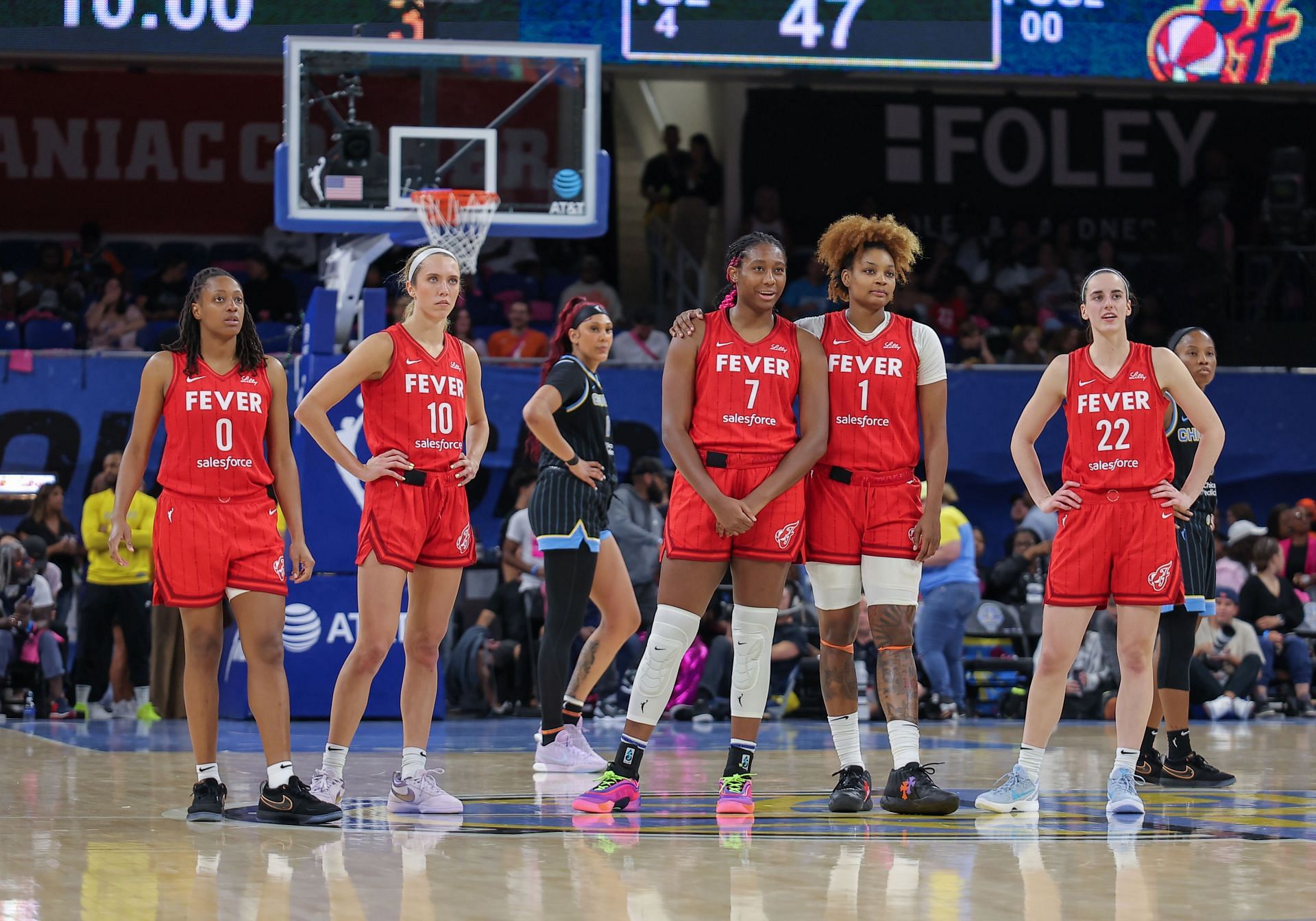 Caitlin Clark with her Indiana Fever teammates. (Photo: GETTY)