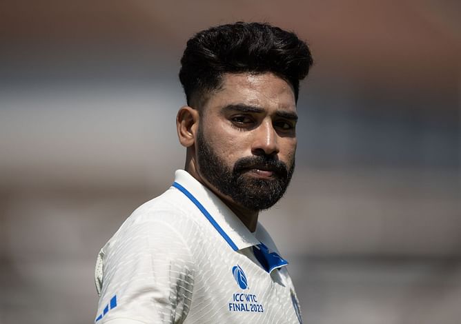 [In Pictures] Mohammed Siraj tries to convince Rohit Sharma to bowl spin amid bad light in IND vs BAN 2024 1st Test