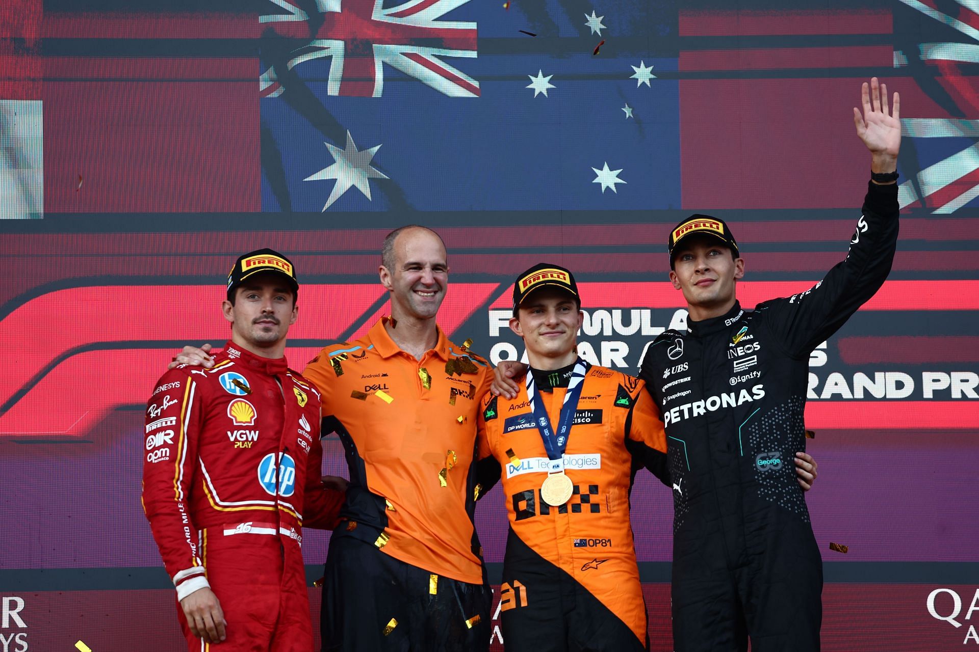 Charles Leclerc (L) of Ferrari, Oscar Piastri (second from right) of McLaren, and George Russell (R) of Mercedes after the Formula 1 Grand Prix of Azerbaijan. Source: Getty