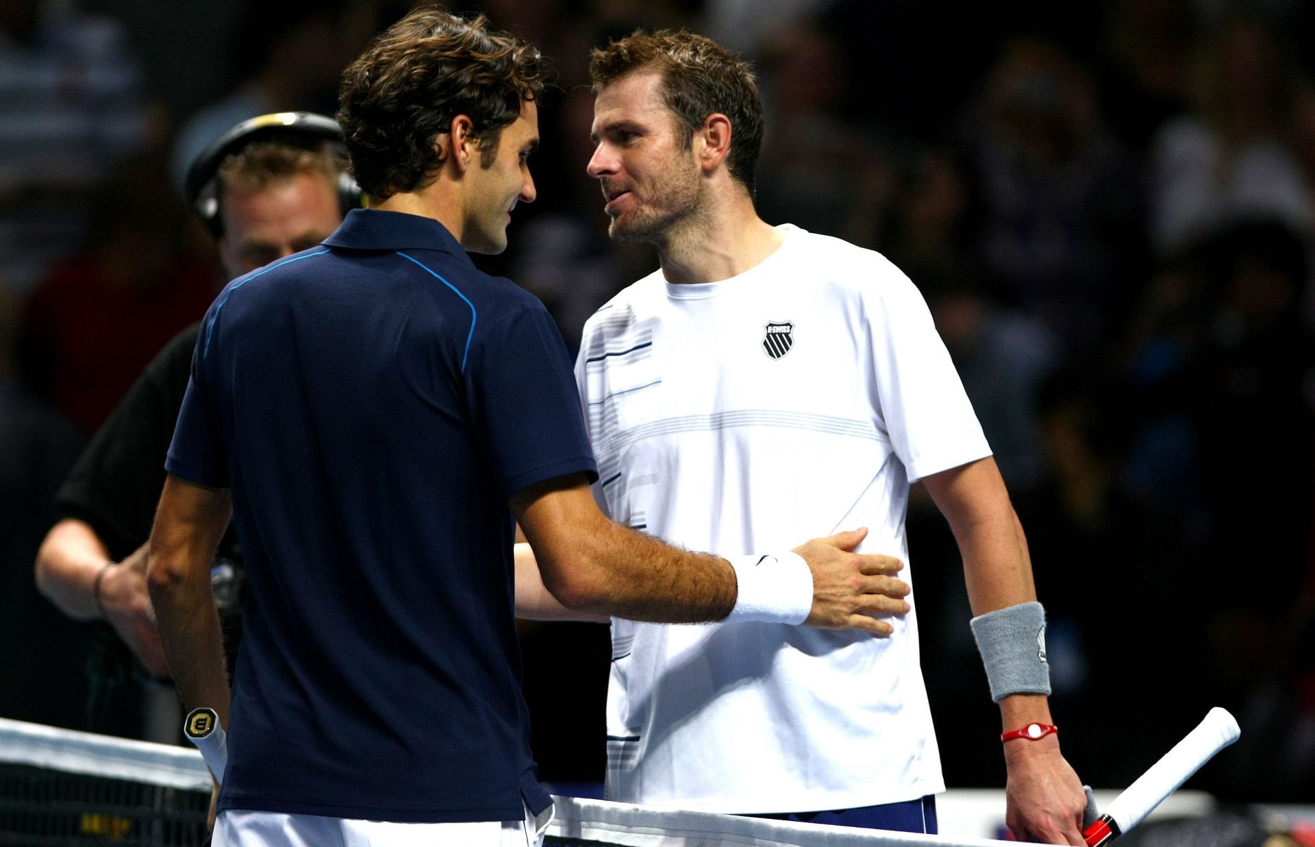 Roger Federer (L) and Mardy Fish | Source: Getty