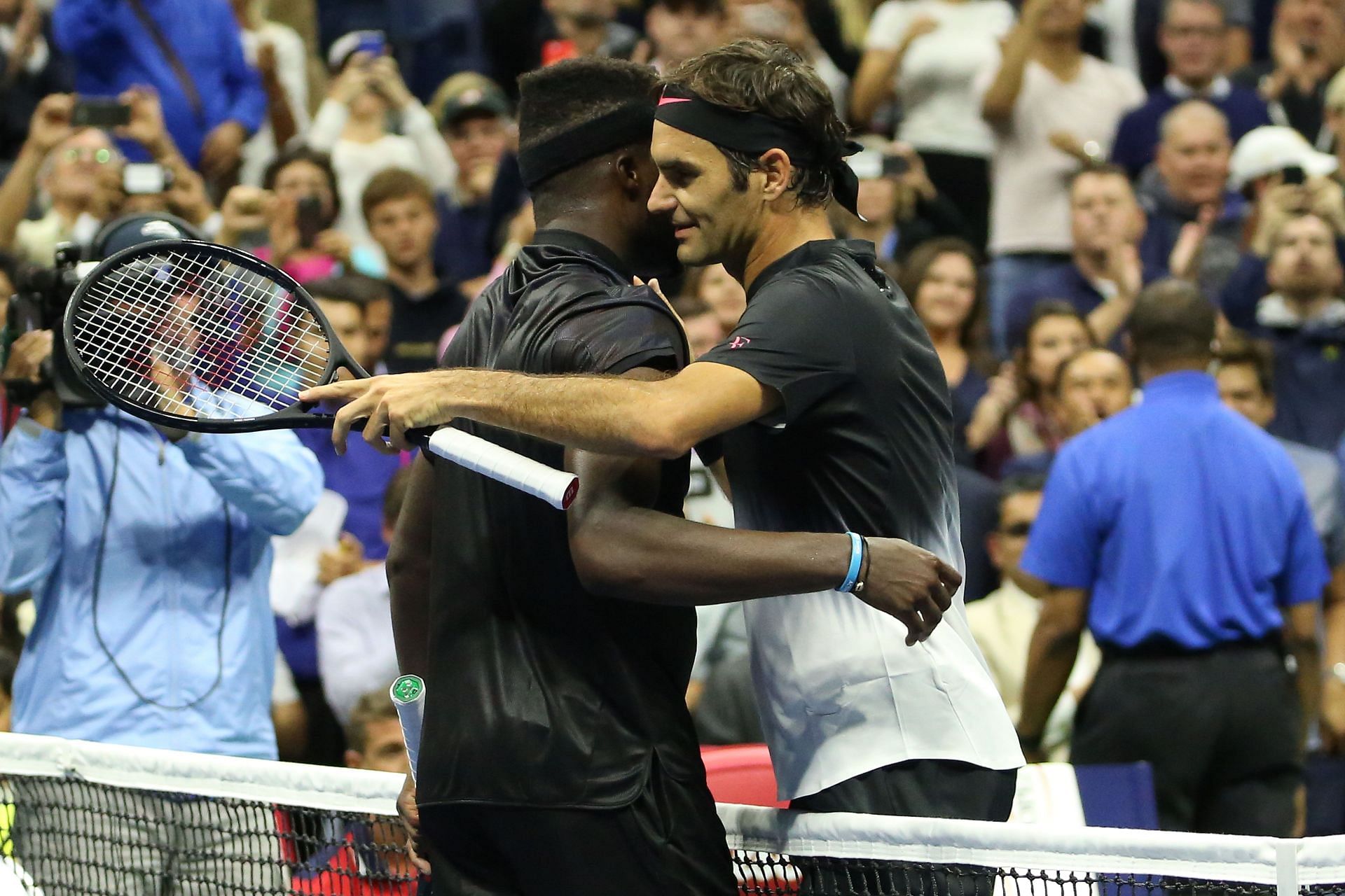 Frances Tiafoe and Roger Federer at the 2017 US Open. (Image: Getty)