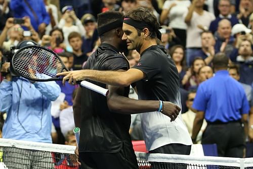 Frances Tiafoe and Roger Federer at the 2017 US Open. (Image: Getty)