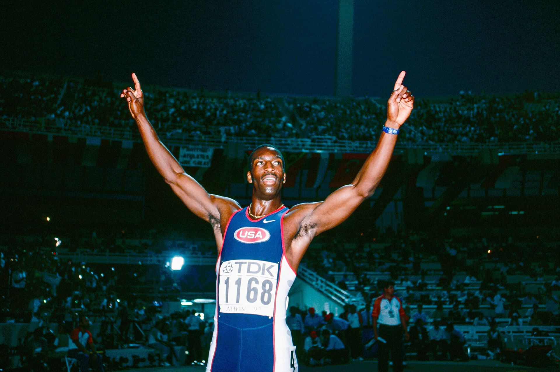 Michael Johnson of the USA celebrating after winning the 400m event at the 1997 IAAF World Athletics Championships [Image Source: Getty]