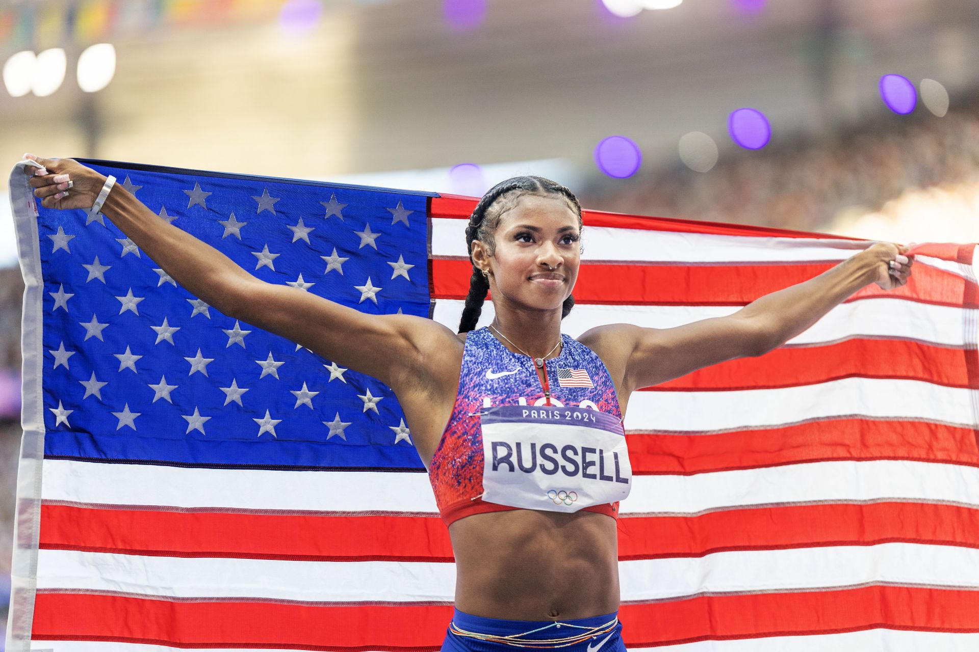 Masai Russell celebrates her gold medal win in the Women&#039;s 100m hurdles Final during the 2024 Summer Olympic Games in Paris, France. (Photo via Getty Images)