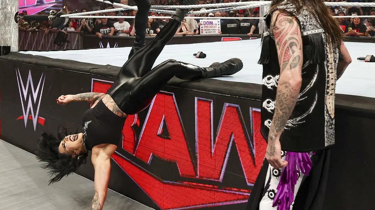 Rhea getting entangled in the ropes (via WWE
