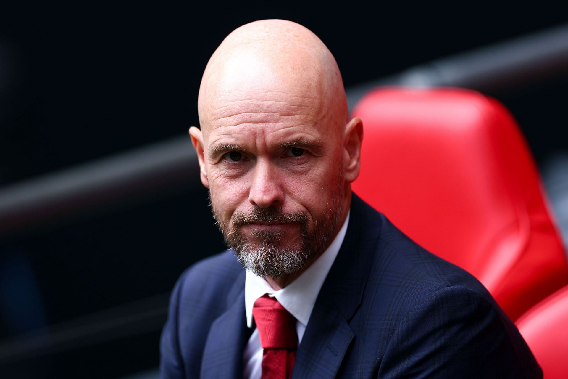 Manchester United boss Erik ten Hag looks on.