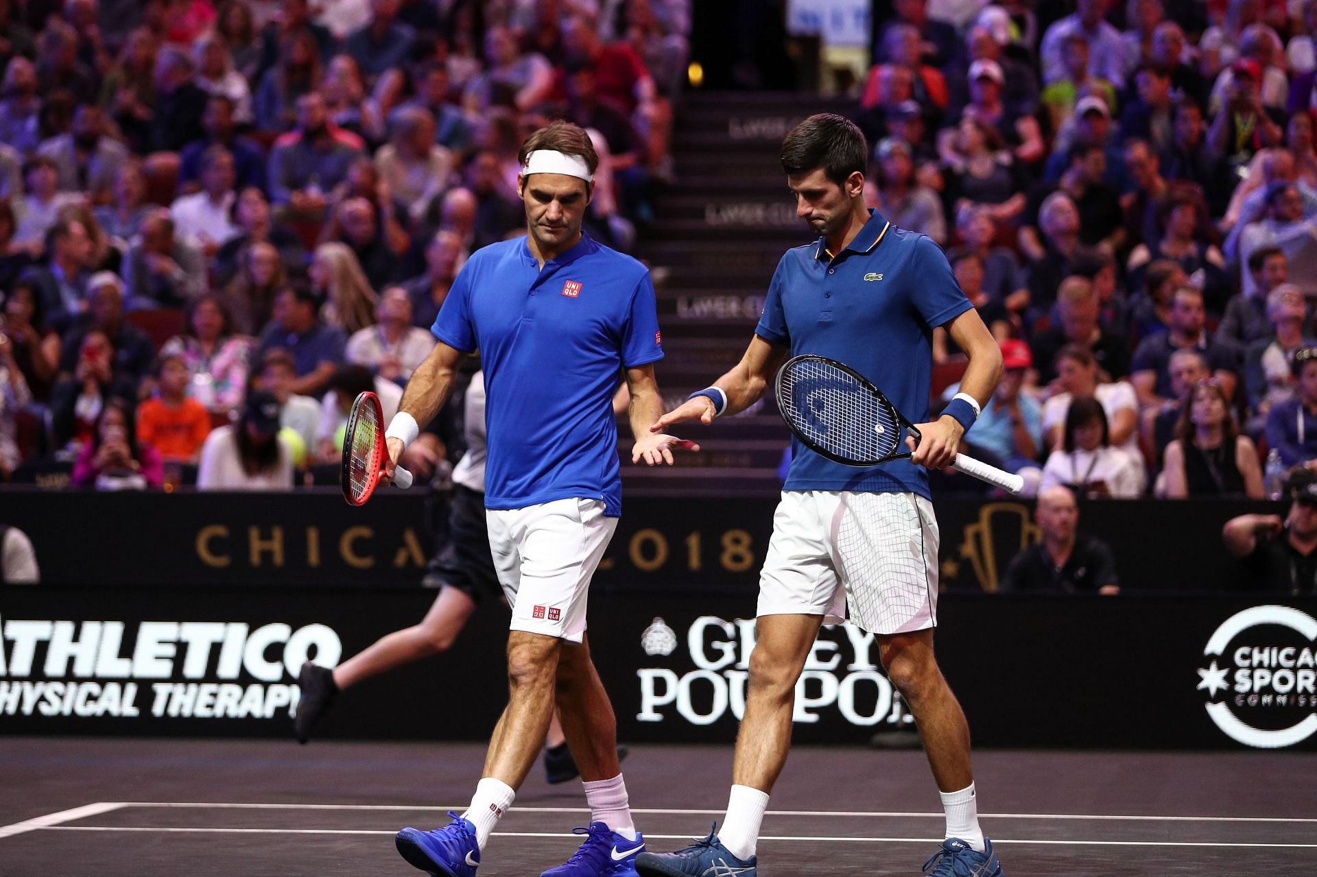 Roger Federer (left) and Novak Djokovic at the 2018 Laver Cup (Image via Getty)