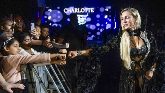 Top WWE name says Charlotte Flair's the reason she got into wrestling