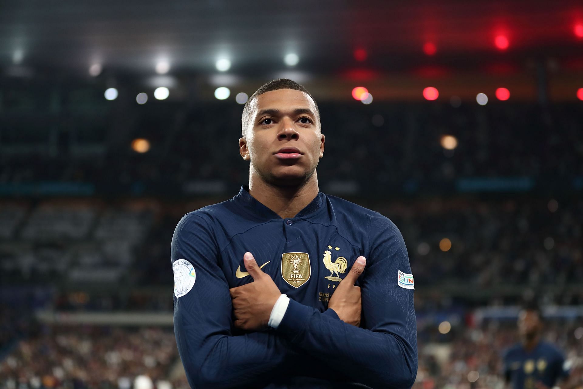 Kylian Mbappe hitting his celebration in a game for France (Image via Getty)