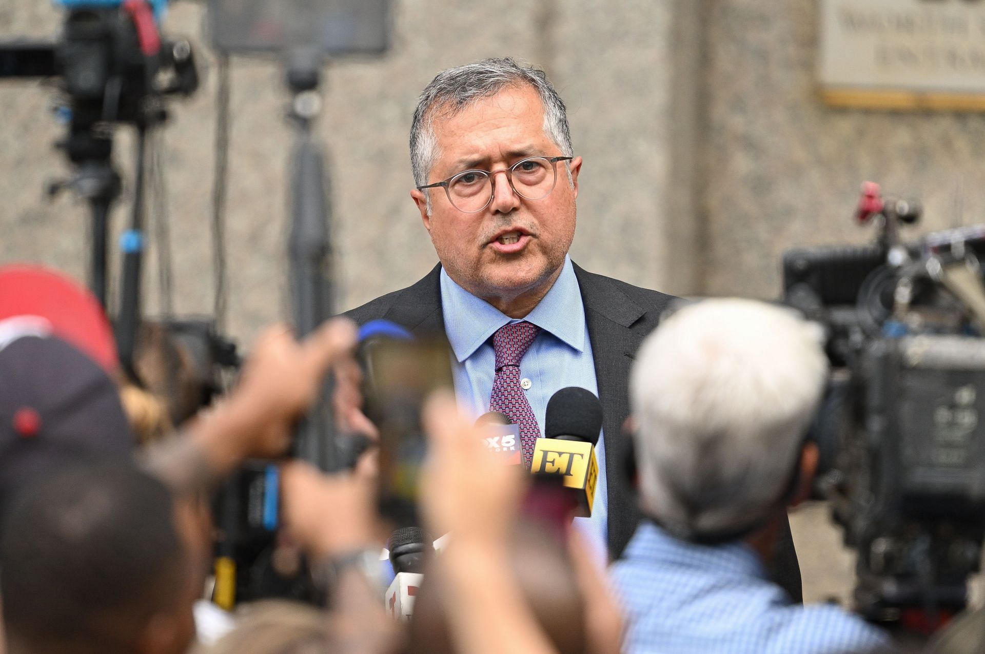 Lawyer for Sean Combs, Marc Agnifilo, speaks to media outside U.S. District Court on September 17 (Image via  James Devaney/Getty)