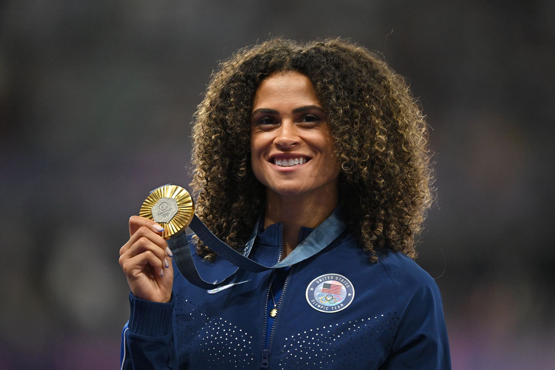 Sydney McLaughlin-Levrone celebrates with her women&#039;s 400m hurdles gold medal at the 2024 Summer Olympic Games in Paris, France. (Photo via Getty Images)