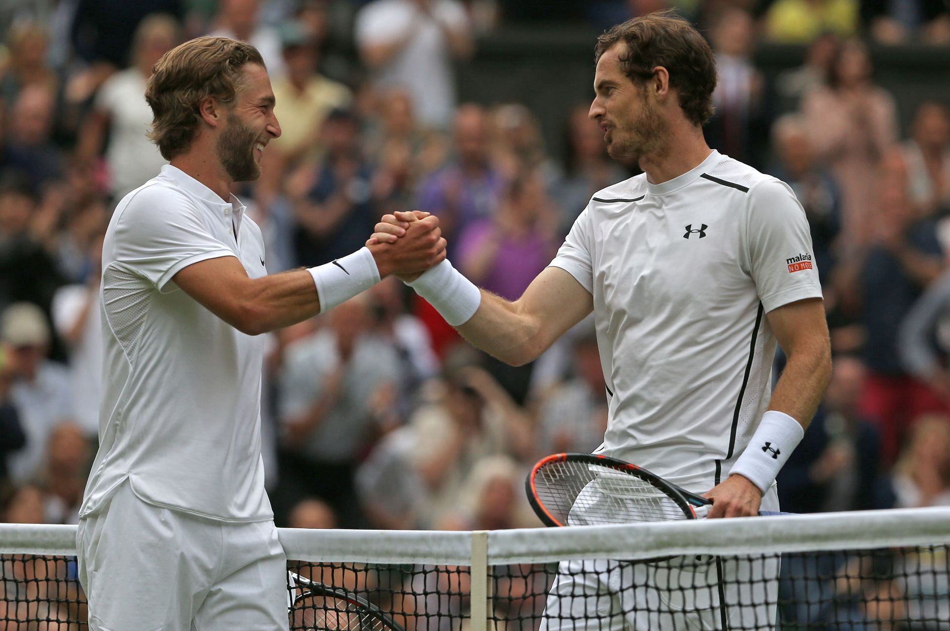 Liam Broady (L), and Andy Murray at Wimbledon 2016 (Image: Getty)