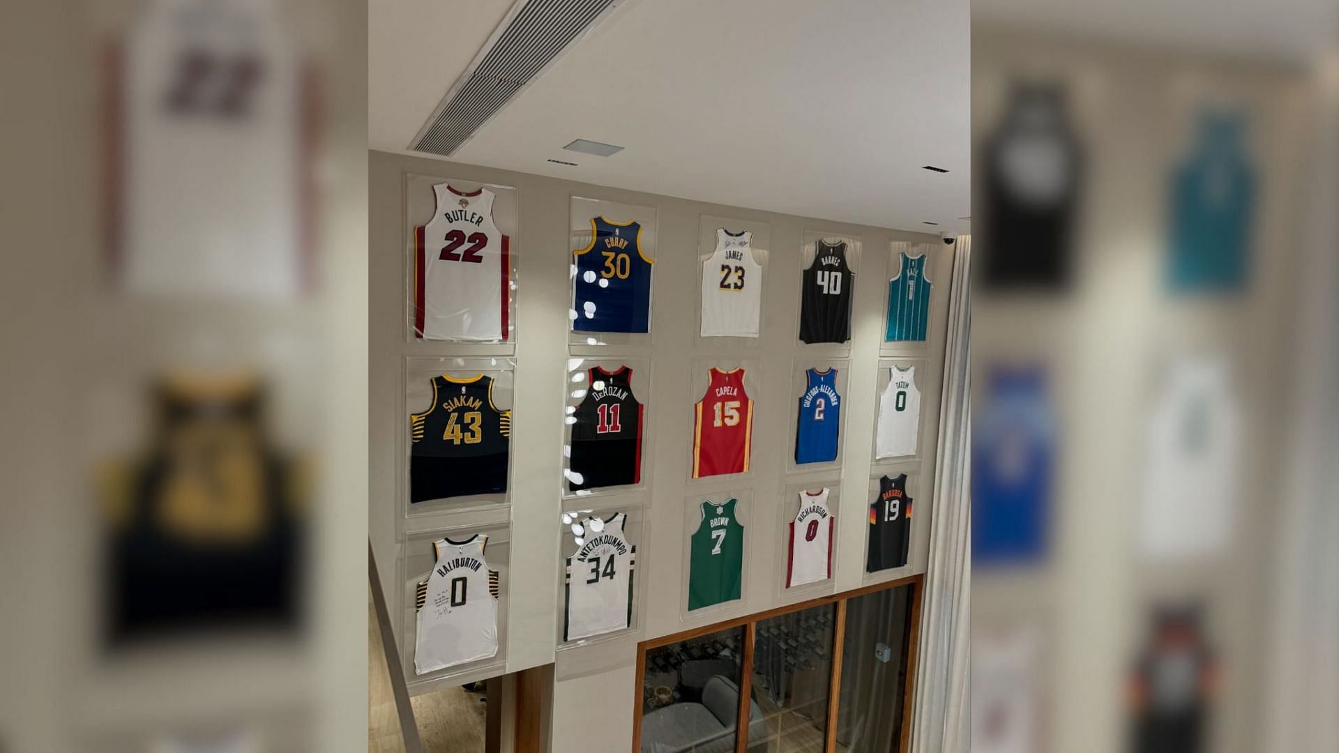 Vini Jr. shares a photo of his collection of his signed NBA jerseys