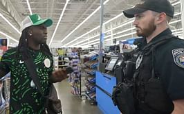Kai Cenat gets involved in heated altercation and stranger calls the cops on him for livestreaming in Walmart