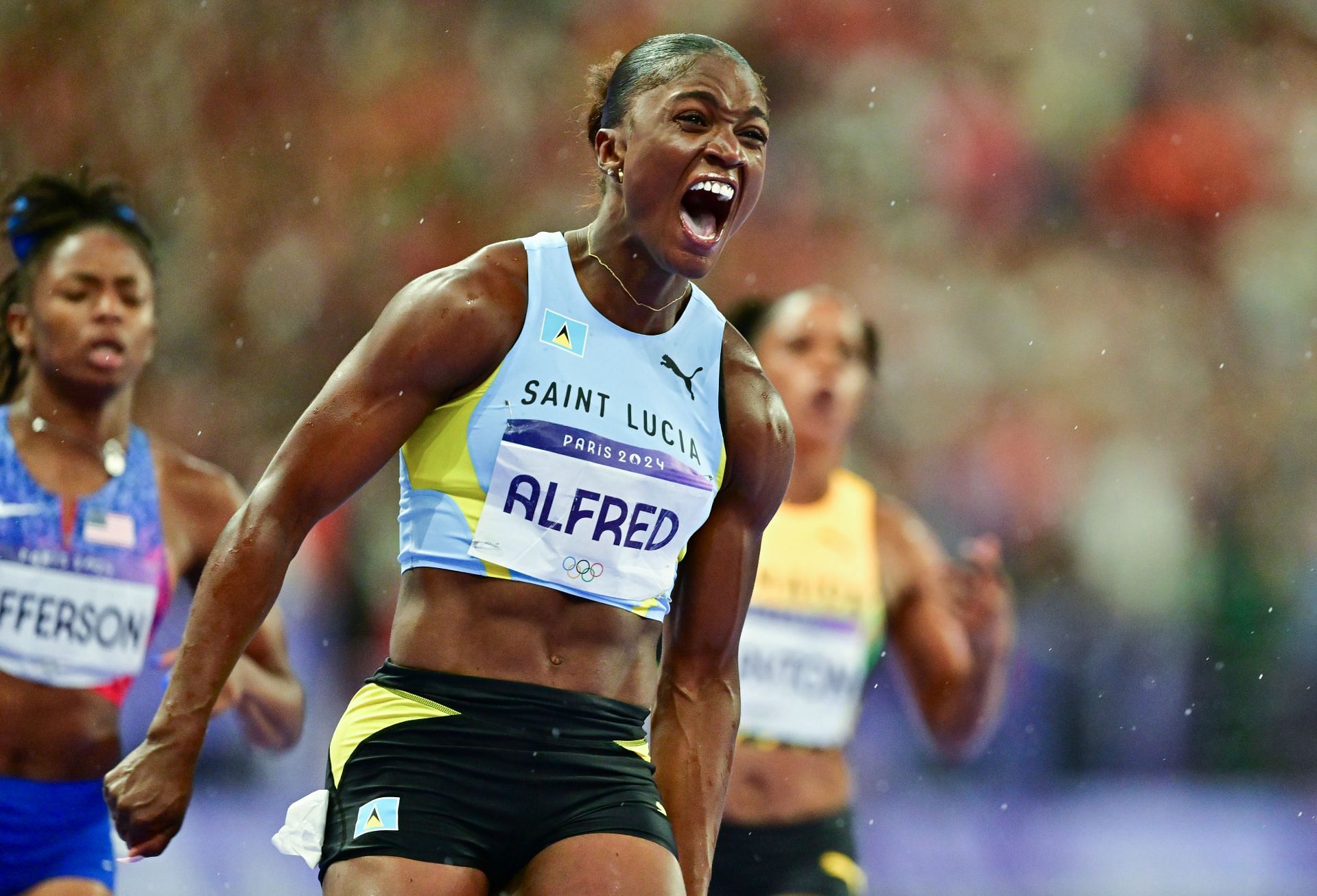 Julien Alfred after winning the Women&#039;s 100m gold (Image via: Getty)