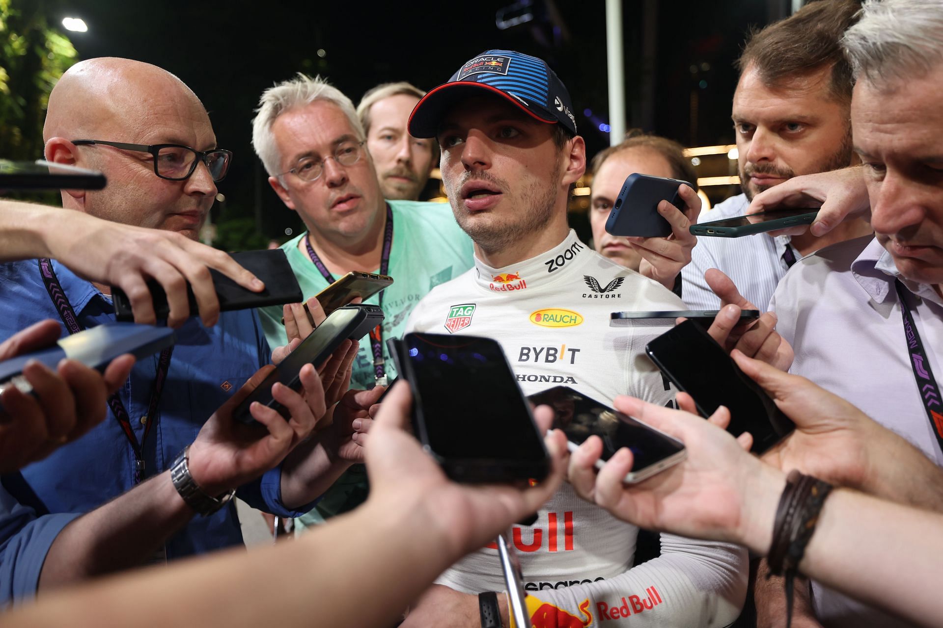 A gaggle of journalists surround Max Verstappen at the F1 Grand Prix Of Singapore. Source: Getty Images