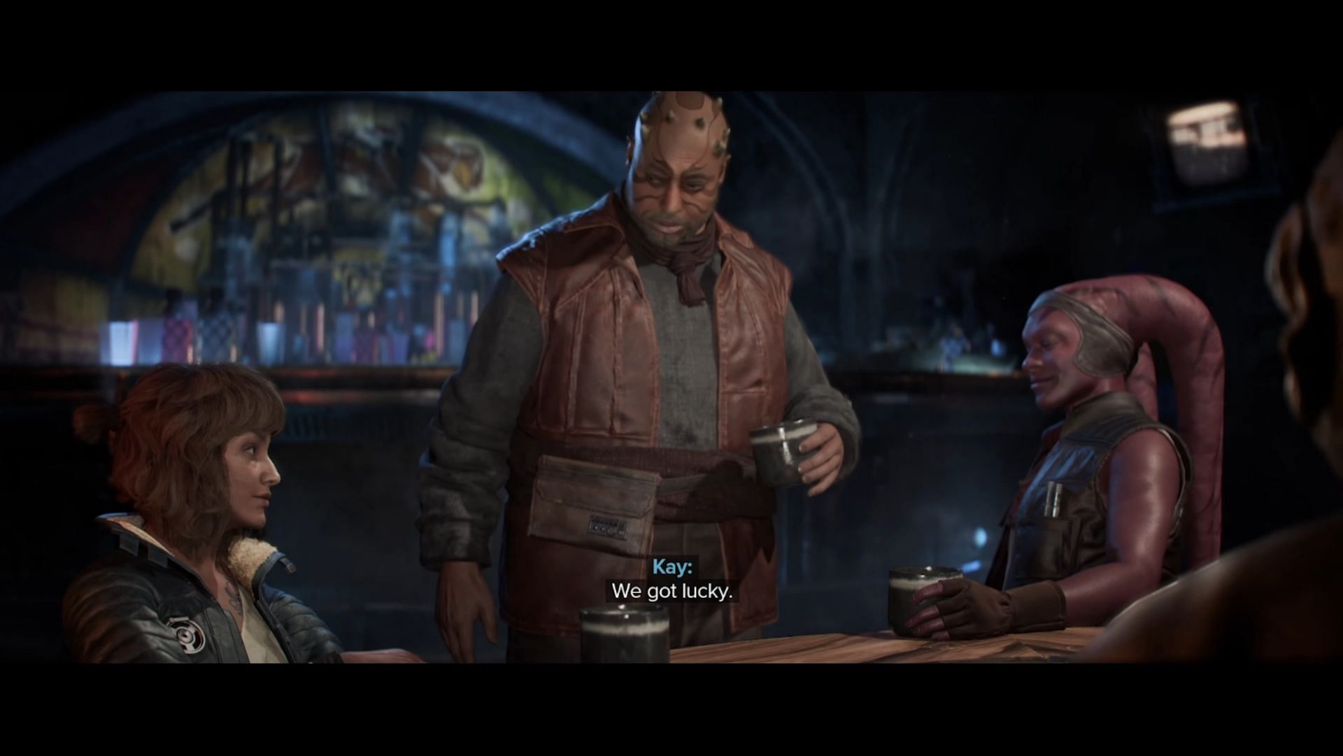 Kay has one final drink with the team (Image via Ubisoft)