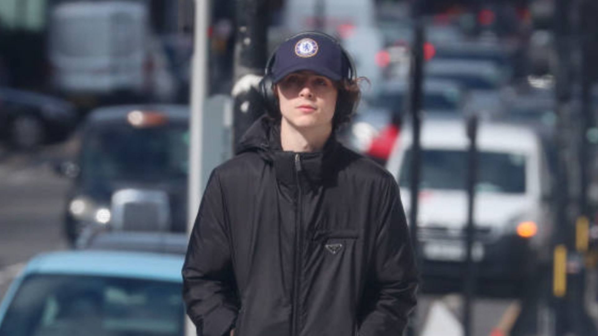 Timoth&eacute;e Chalamet wearing a chelsea hat (Photo by Neil Mockford/GC Images)