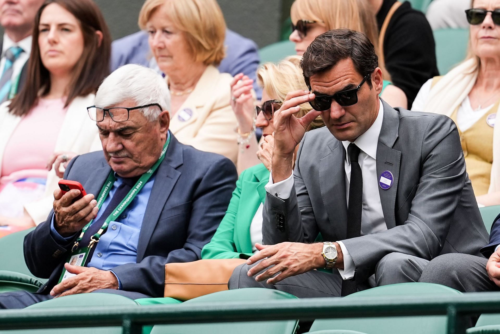 Roger Federer pictured with his parents at the 2024 Wimbledon Championships | Image Source: Getty