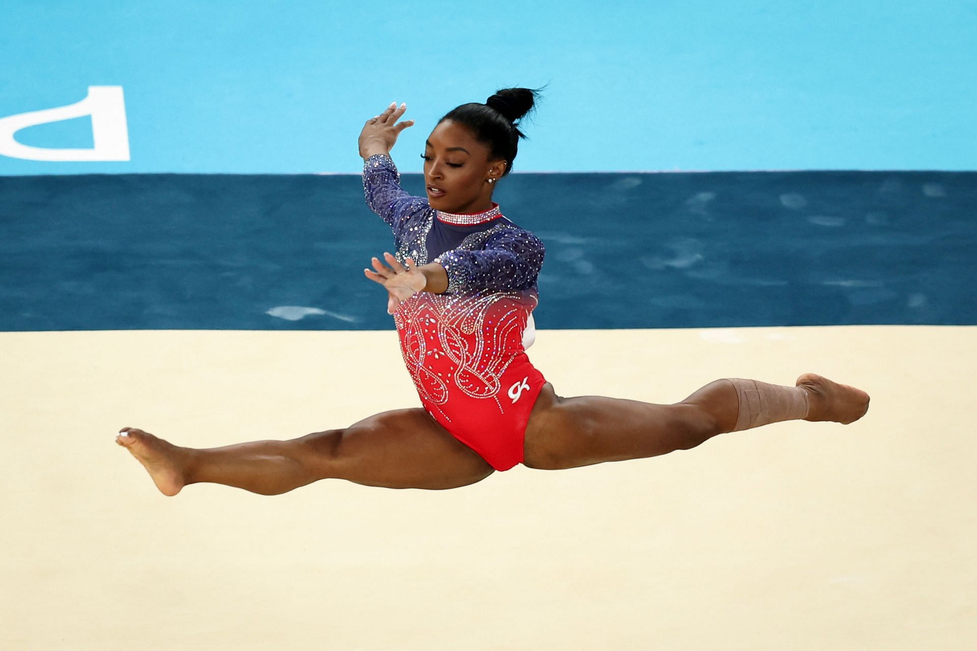 Artistic Gymnastics - Olympic Games Paris 2024: Simone Biles in mid-air while performing her floor routine (Source: Getty)