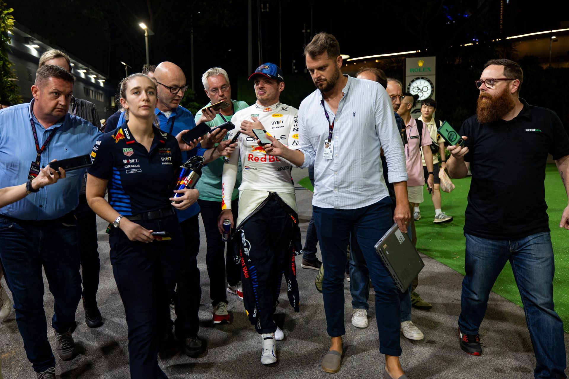 A group of journalists surround Max Verstappen after Singapore GP Qualifying. Source: Getty Images