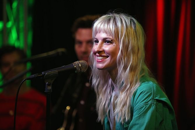 "Oh she spilled"-Internet reacts to Hayley Williams pausing Paramore’s iHeart Radio set to denounce Donald Trump