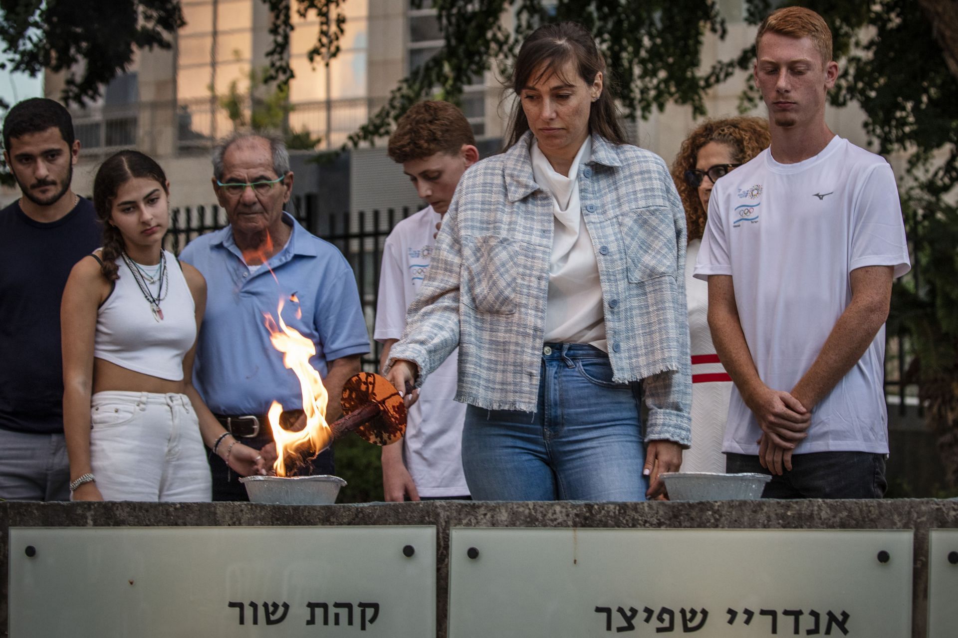 People mourning on the 50th anniversary of the Munich Summer Olympics attacks(Image via Getty)