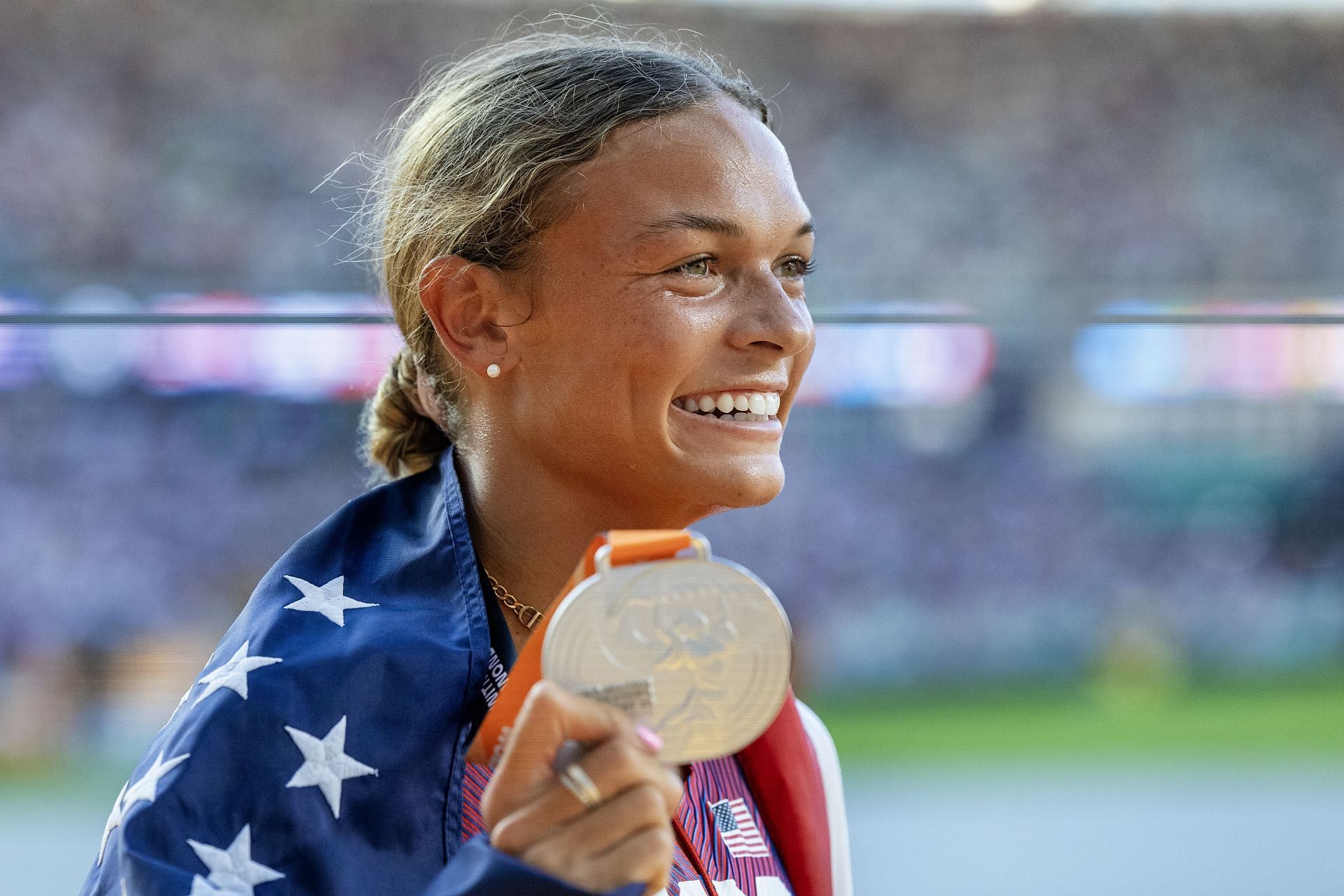 Anna Hall celebrates her silver medal win in the Heptathlon competition at the World Athletics Championships in Budapest, Hungary. (Photo via Getty Images)