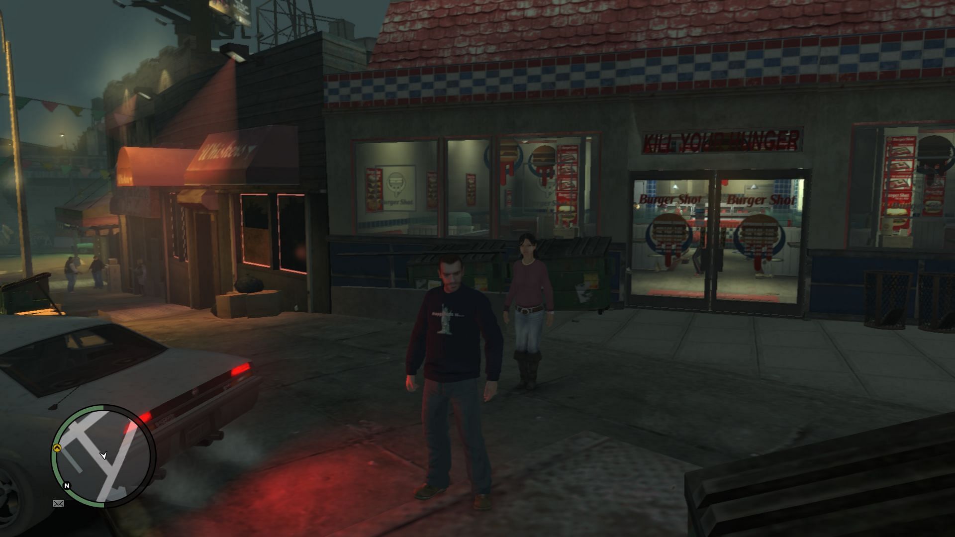 Niko and Carmen Ortiz in GTA 4 (Image via Rockstar Games)