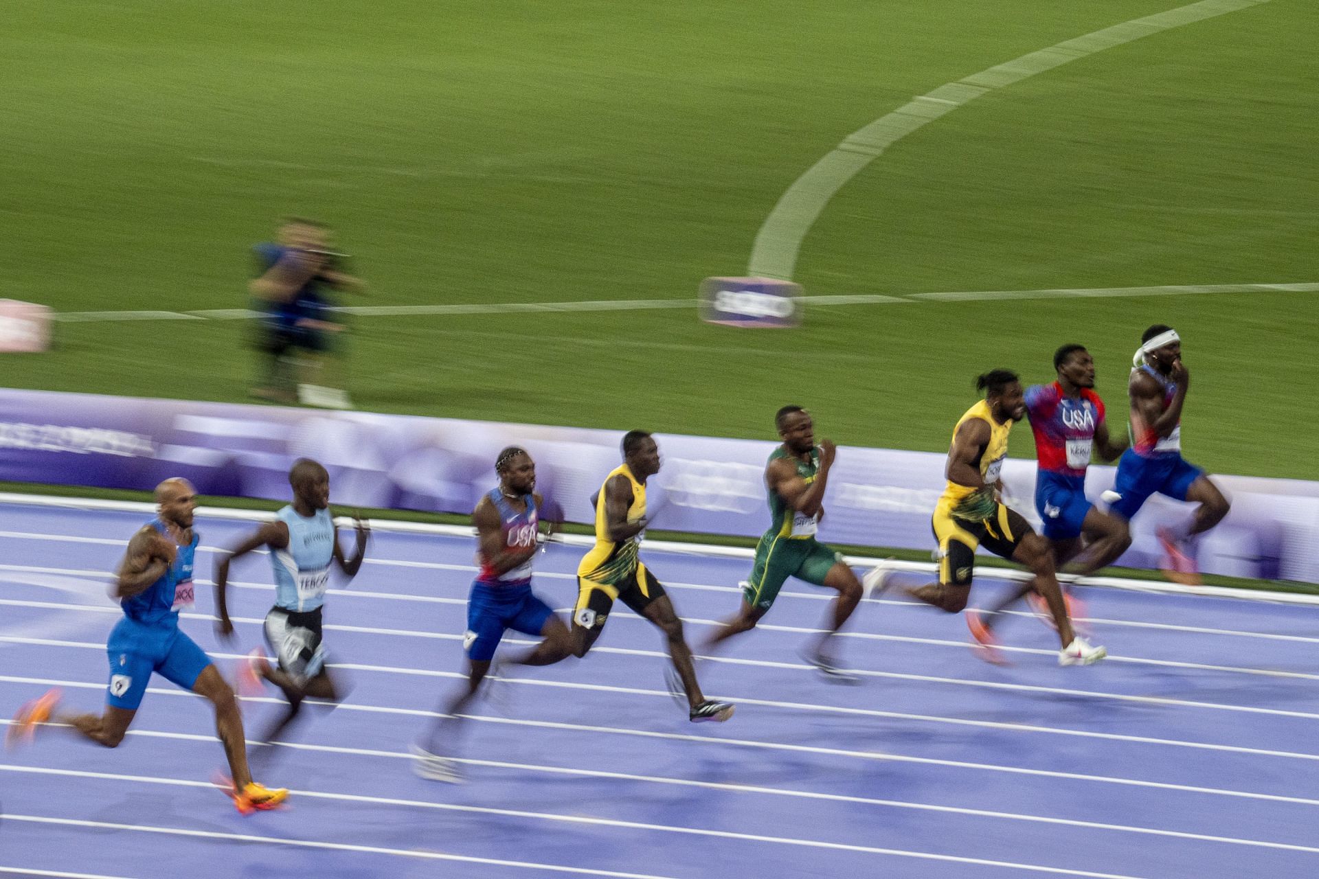 Letsile Tebogo of Botswana [2nd from Left] and Fred Kerley [2nd from right] in action at the 100m finals in Paris Olympics 2024 [Image Source: Getty]