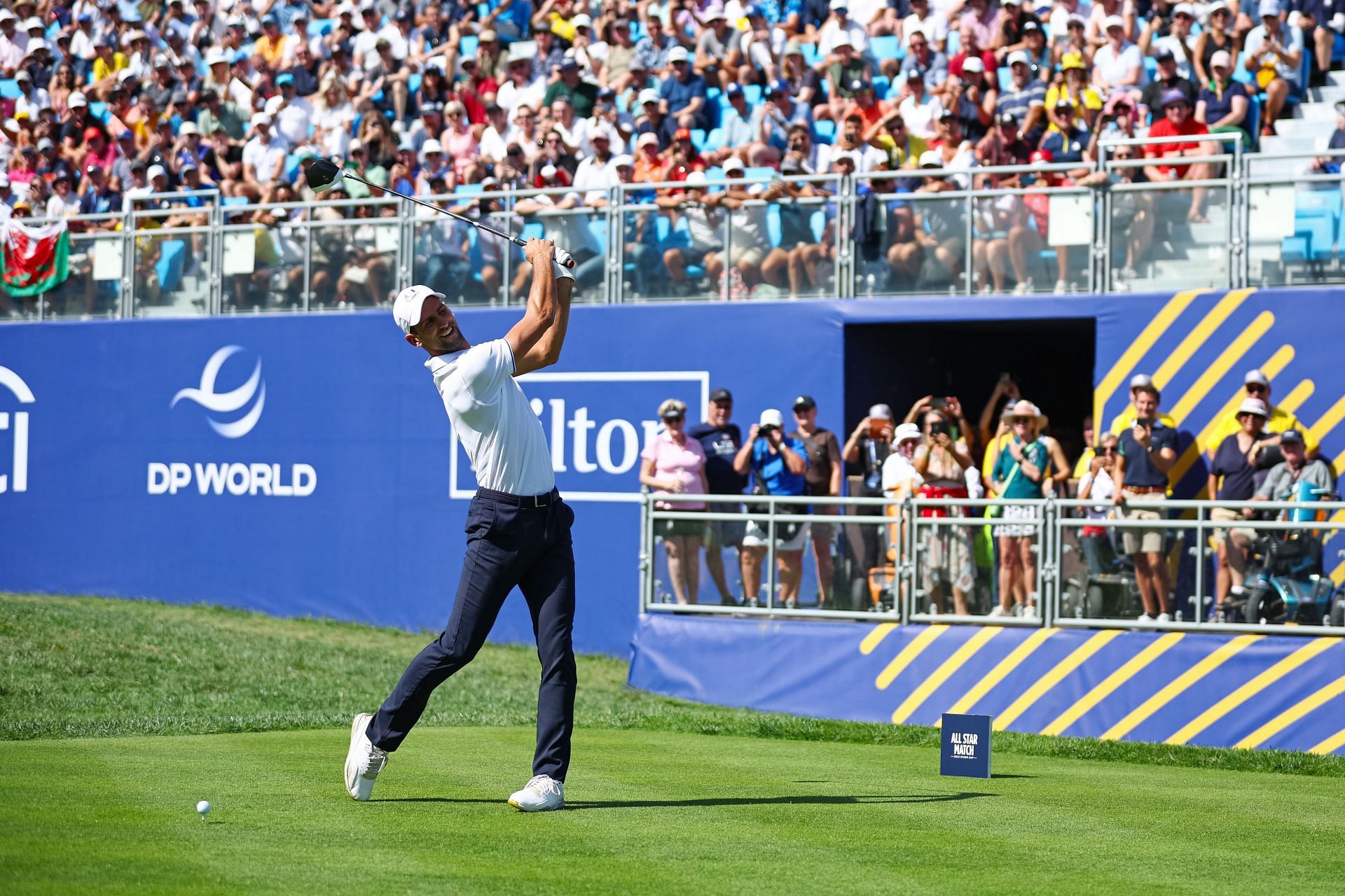 Novak Djokovic hits his tee shot on the first hole at All-Star Match during the Ryder Cup (Image Source: Getty)