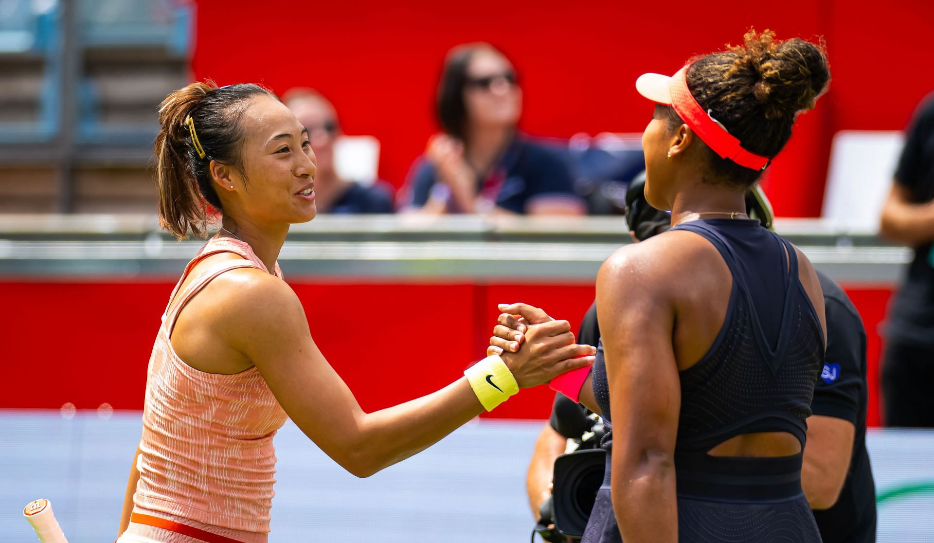 Zheng Qinwen (L) and Naomi Osaka at the Ecotrans Ladies Open Berlin 2024. (Image: Getty)