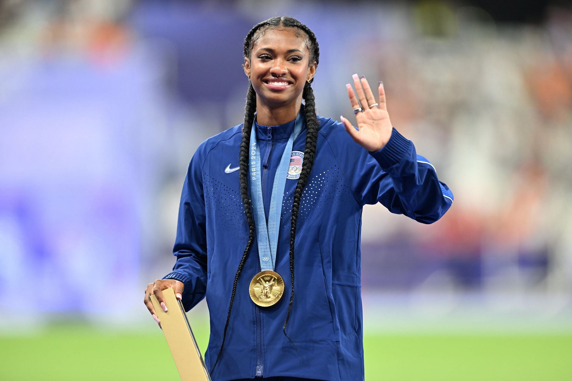 Masai Russell with her gold medal at the Paris Olympics (Source: Getty)