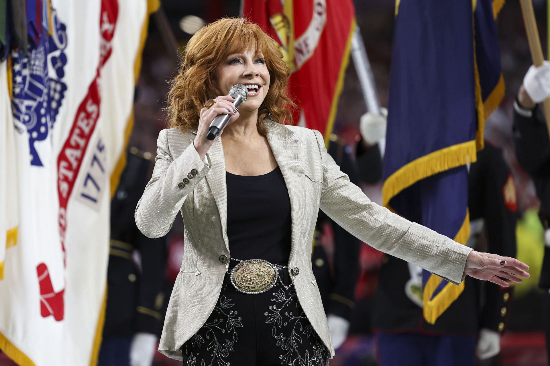 Reba McEntire of The Voice season 26 performs the national anthem Super Bowl LVIII - San Francisco 49ers v Kansas City Chiefs - Source: Getty