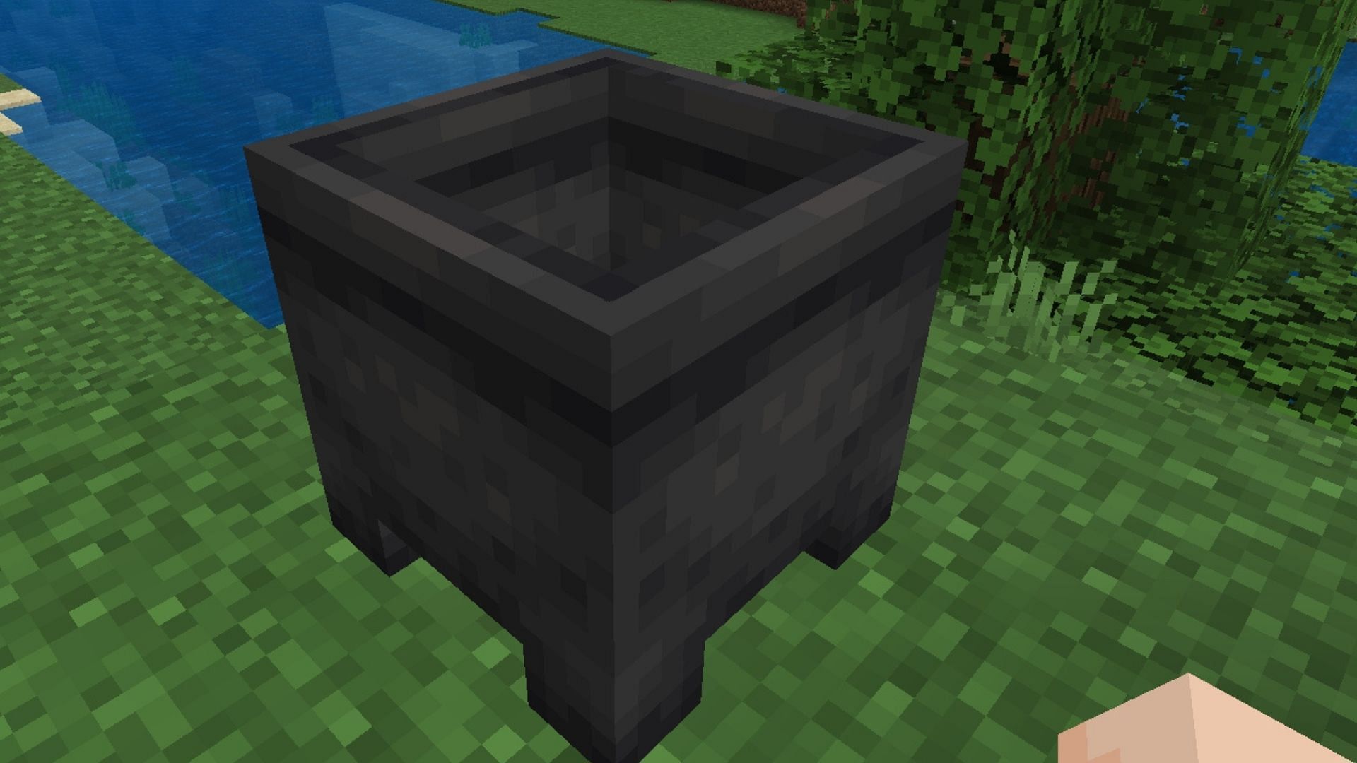 Crafting the cauldron (Image via Mojang Studios)