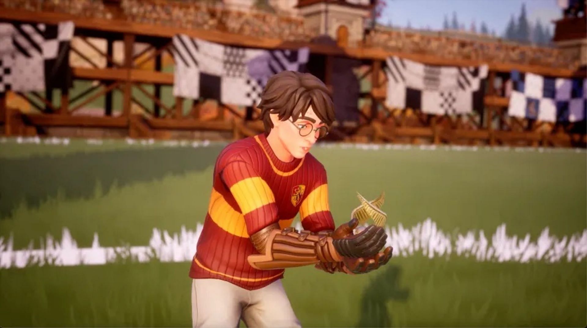 Harry Potter captures the Snitch in Quidditch Champions. (Image via Warner Bros)