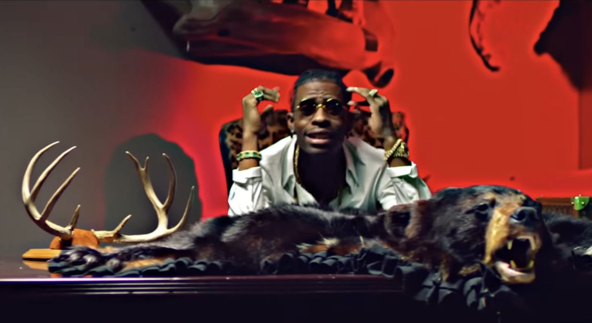 Rich Homie Quan in the music video for &#039;Flex (Ooh, Ooh, Ooh)&#039; uploaded to YouTube on April 01, 2015 (Image via YouTube/@WERICHHOMIE)