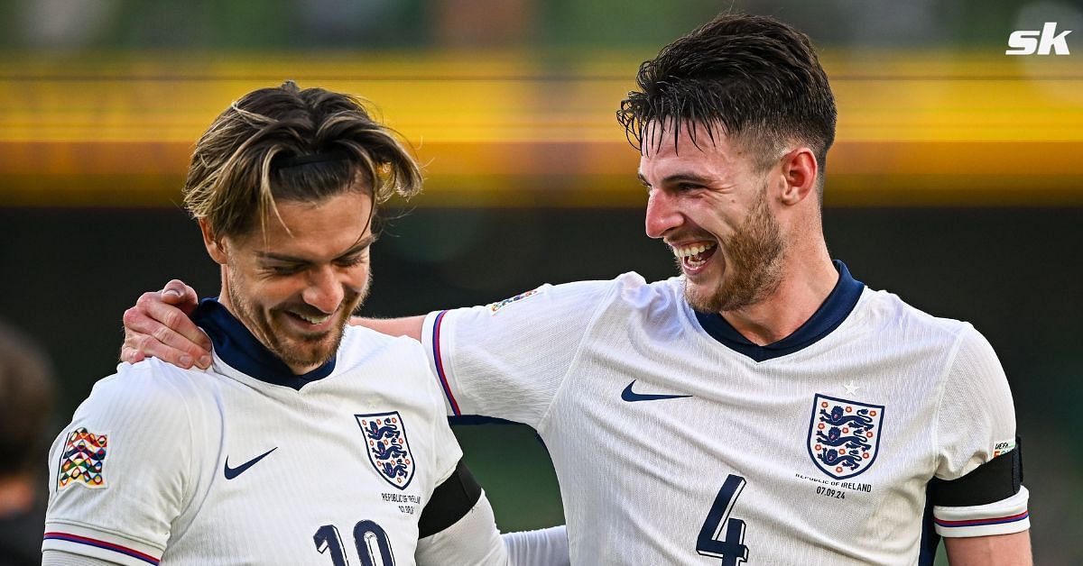 Jack Grealish reacts to banner from Irish fans