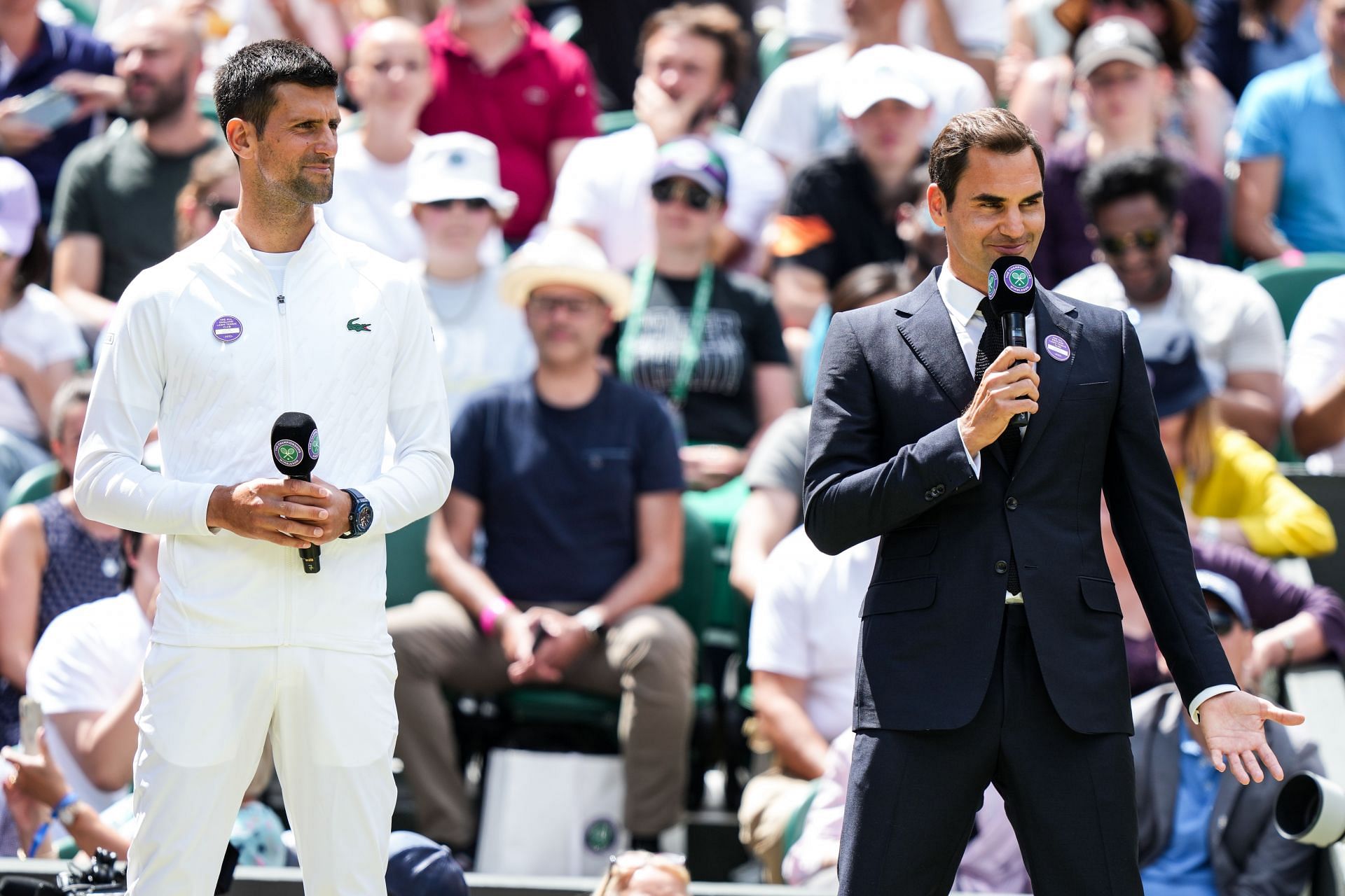 Novak Djokovic (left) &amp; Roger Federer at Wimbledon (Source: Getty)