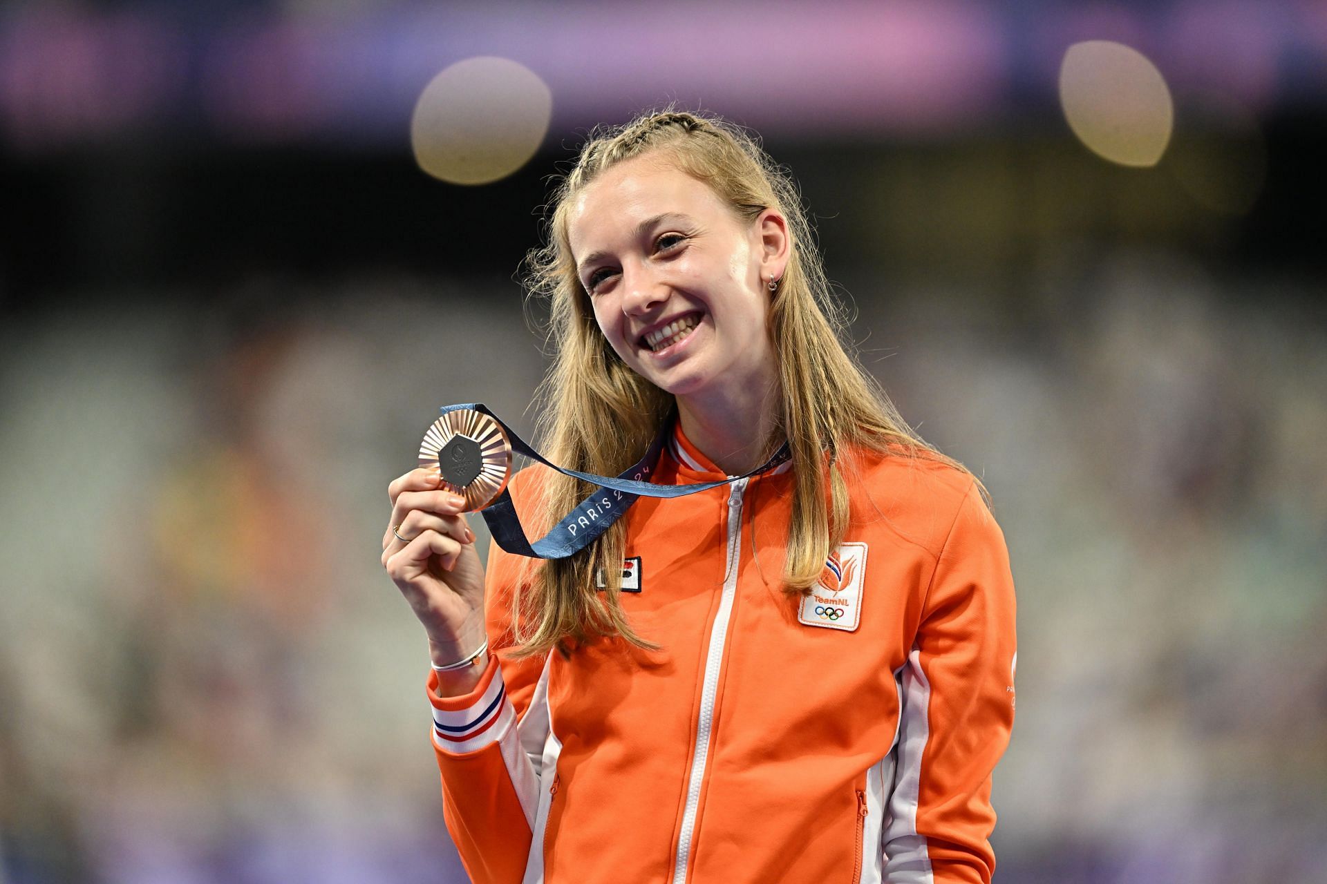 Femke Bol of Team Netherlands celebrates on the podium during the Women&#039;s 400m Hurdles medal ceremony at the Olympic Games 2024 in Paris, France. (Photo via Getty Images)