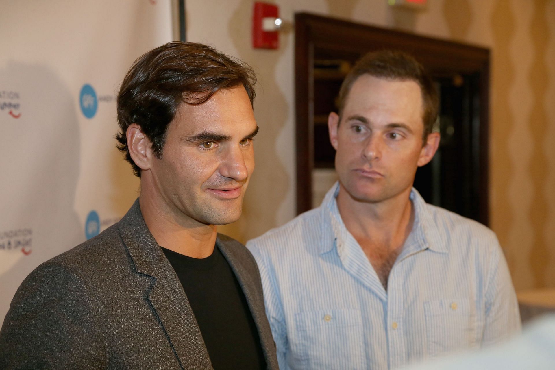 Roger Federer and Andy Roddick (Source: Getty Images)